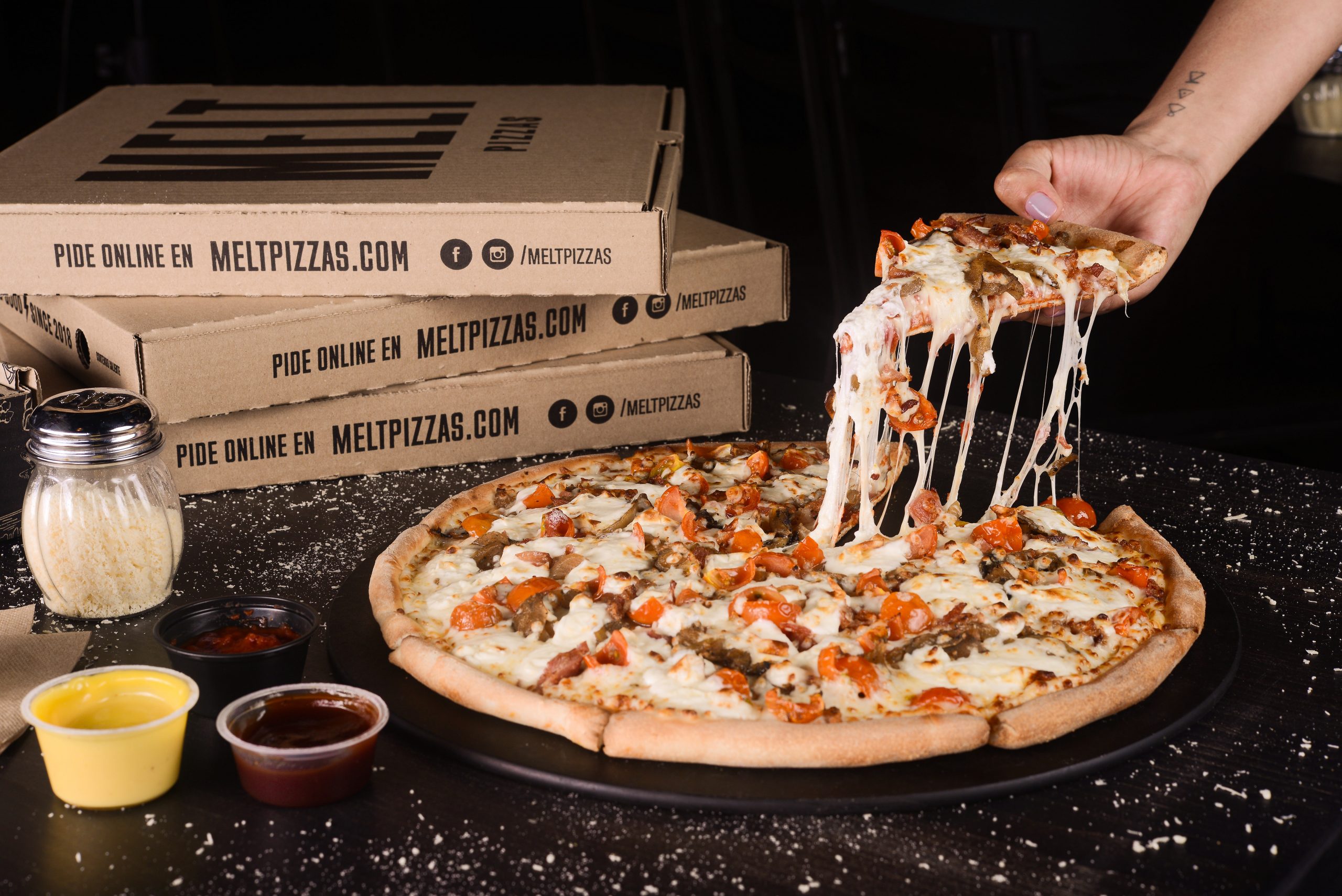 ¿Cuáles son los mejores quesos para preparar una buena pizza?